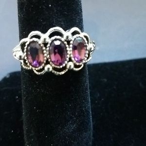 Avon Ring 5 to 6 3 Oval Purple Stones Womans